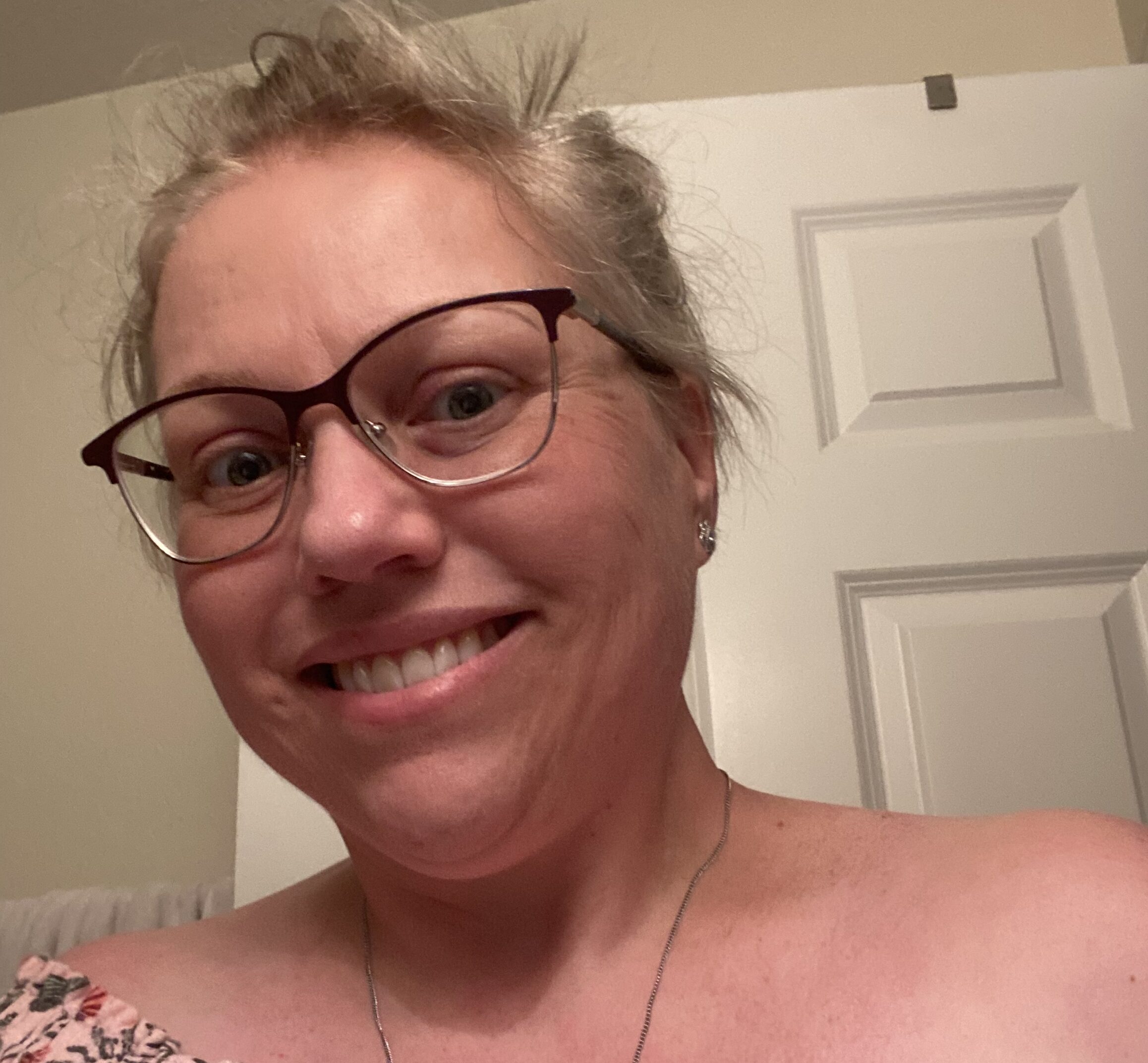 Selfie of blonde woman with glasses—she has type 1 diabetes and shared her time in range story!