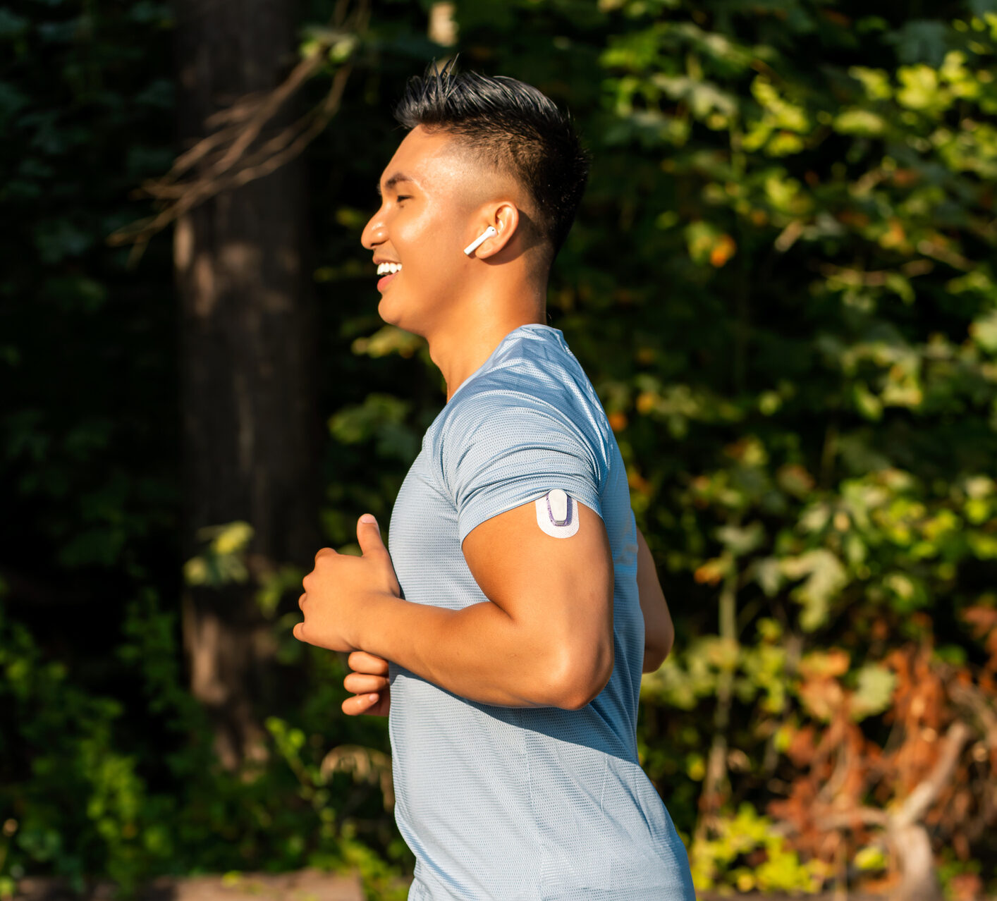 Jogger with Dexcom G6 on his arm