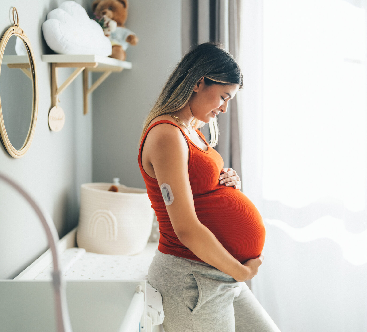 Young woman with diabetes enjoying the last month of her pregnancy