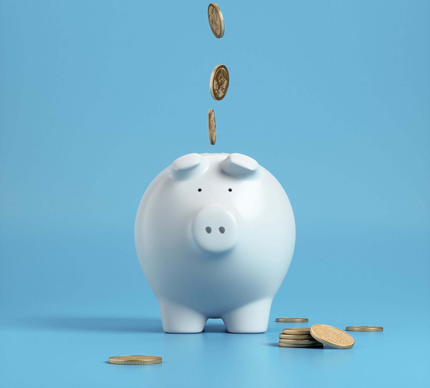 Falling coins in to a white piggy bank, Finance concepts