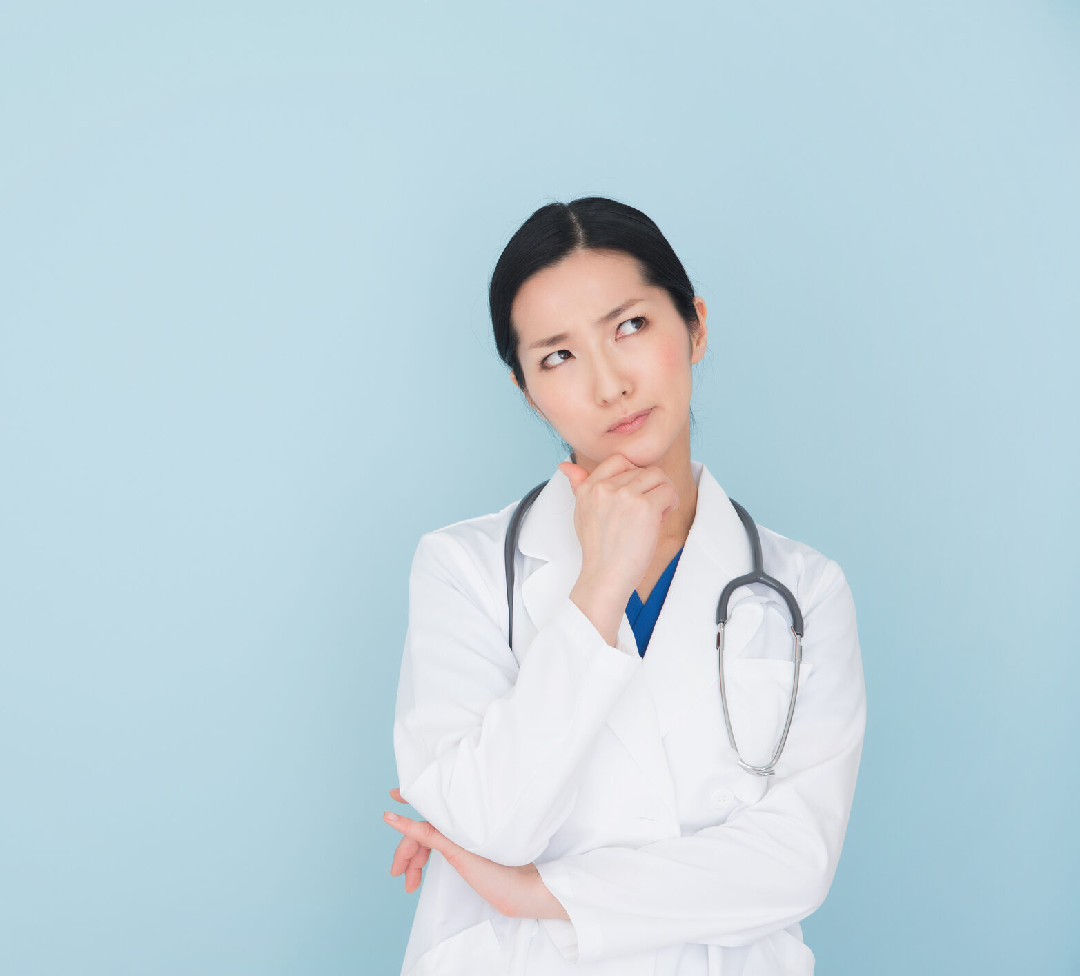 Woman HCP thinking about time in range against blue background